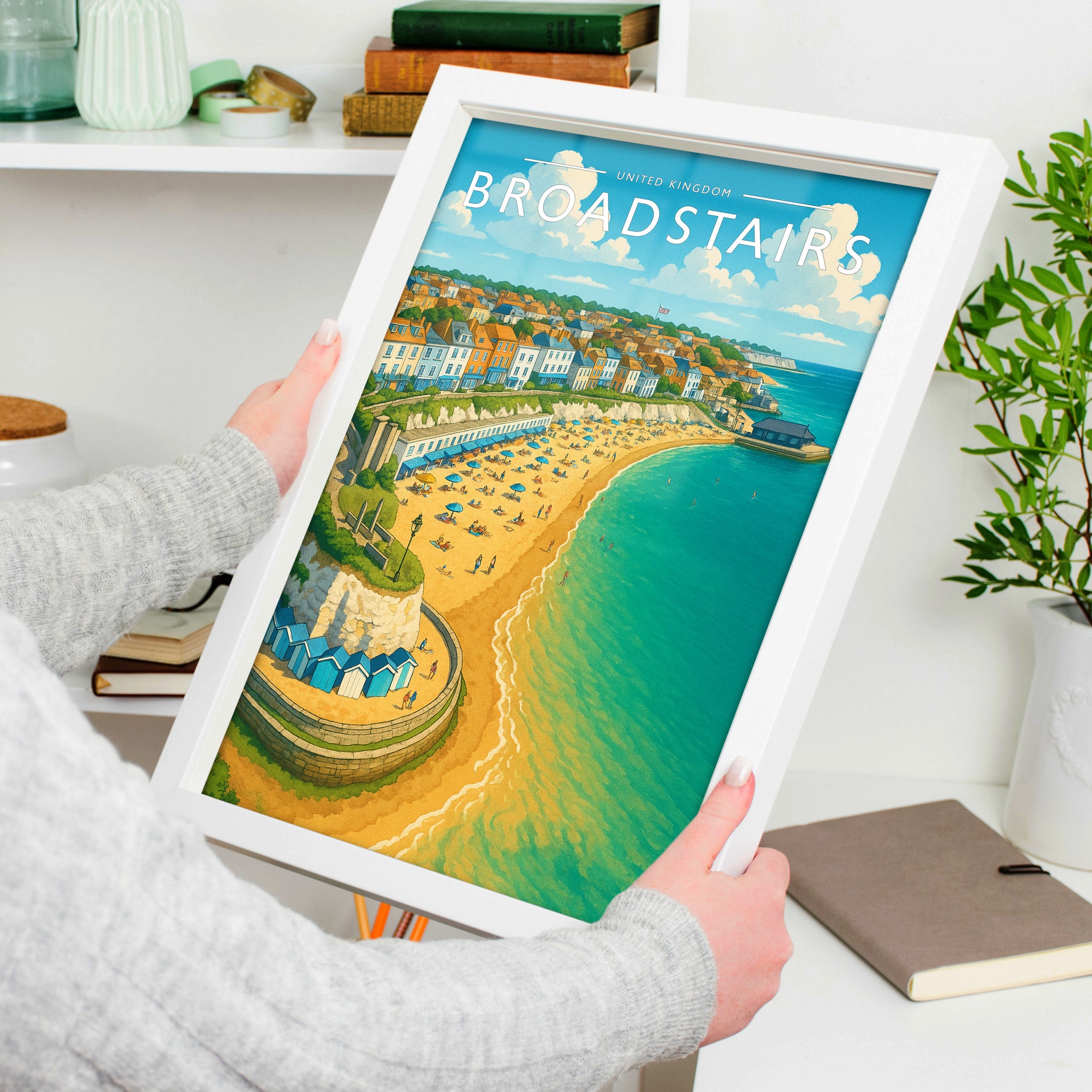 Broadstairs #2 Travel Poster in a white frame, held to show scale