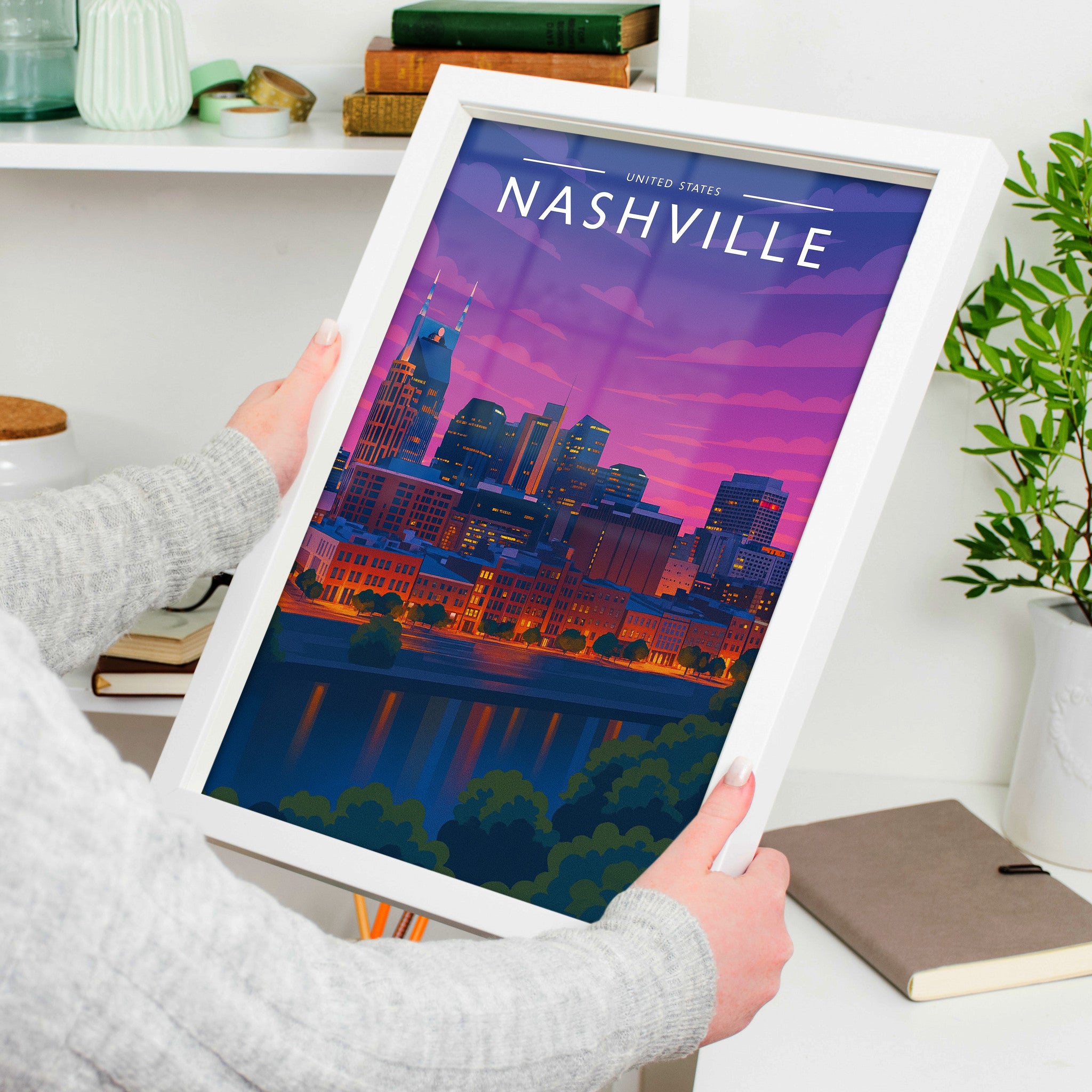 Nashville #2 Travel Poster in a white frame, held to show scale