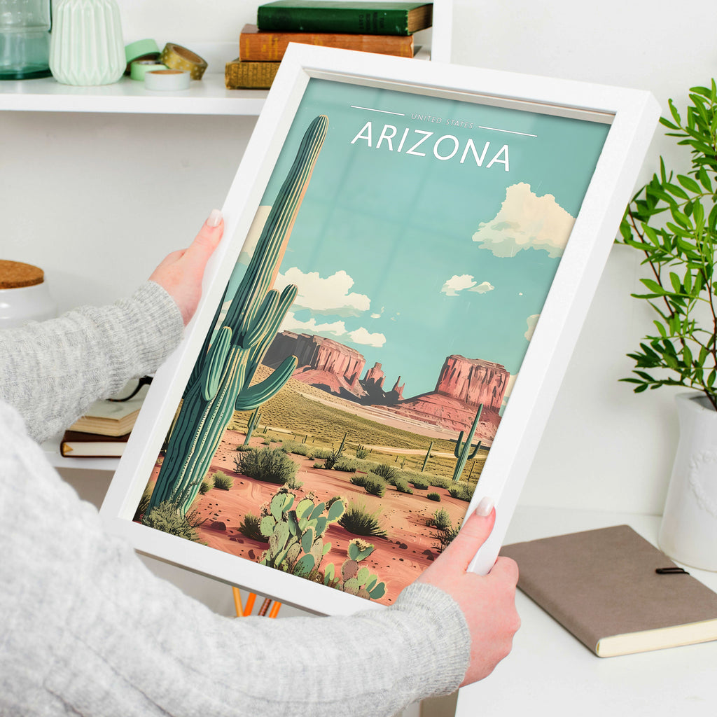 Arizona Travel Poster in a white frame, held to show scale