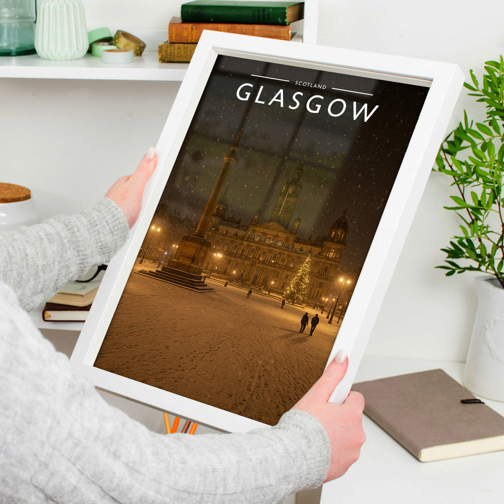 Glasgow Travel Poster in a white frame, held to show scale