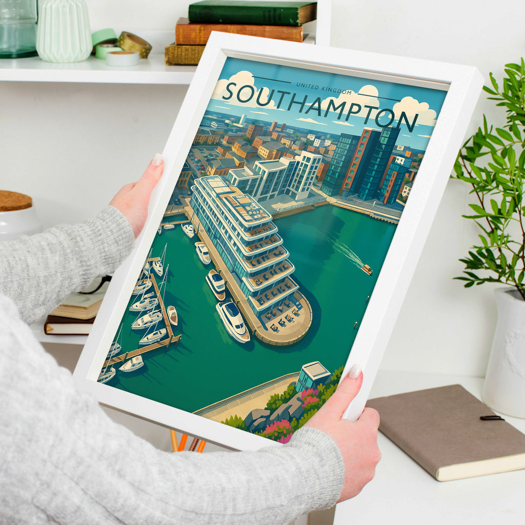 Southampton Travel Poster in a white frame, held to show scale