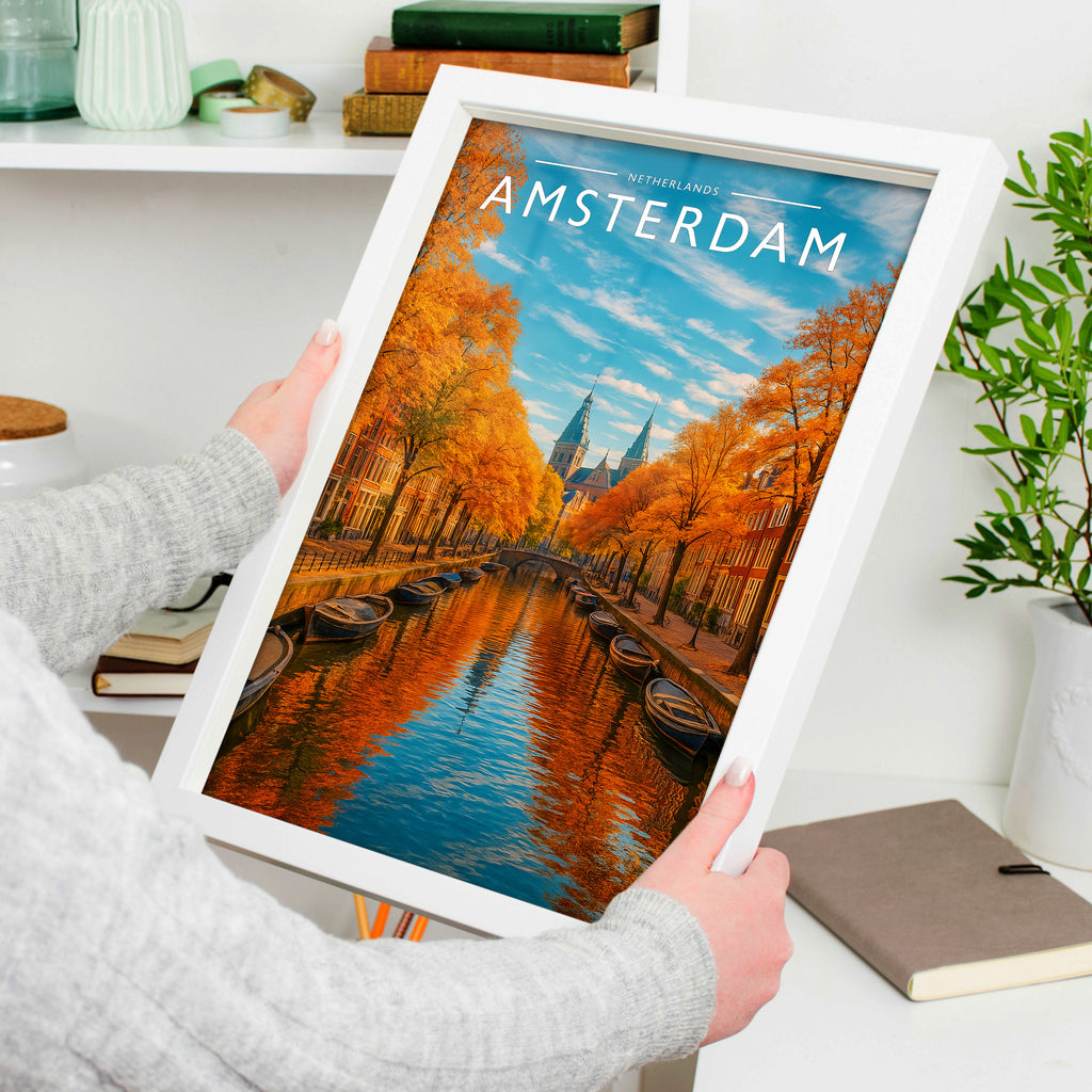 Amsterdam Travel Poster in a white frame, held to show scale
