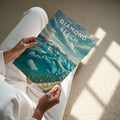 Diamond Beach Travel Poster - A4 print held in hand