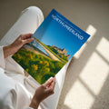 Northumberland Travel Poster - A4 print held in hand