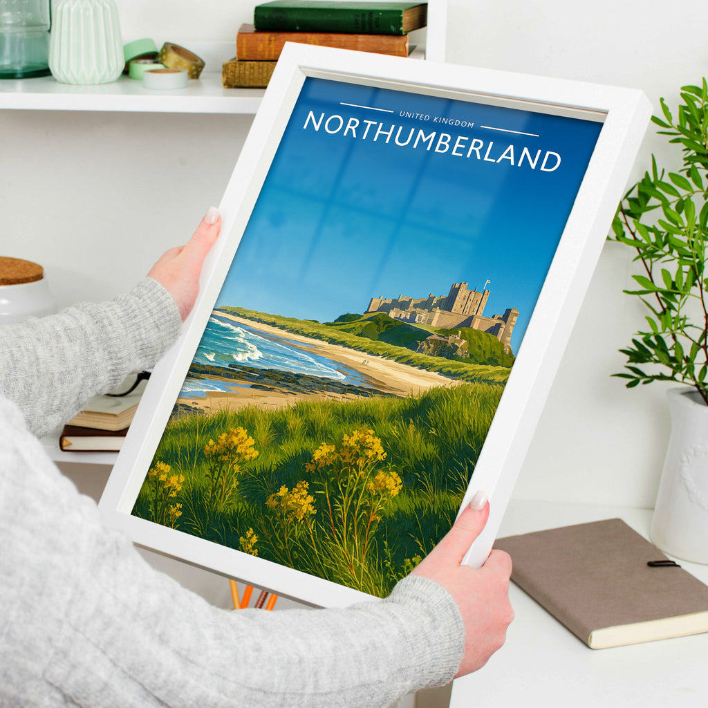 Northumberland Travel Poster in a white frame, held to show scale