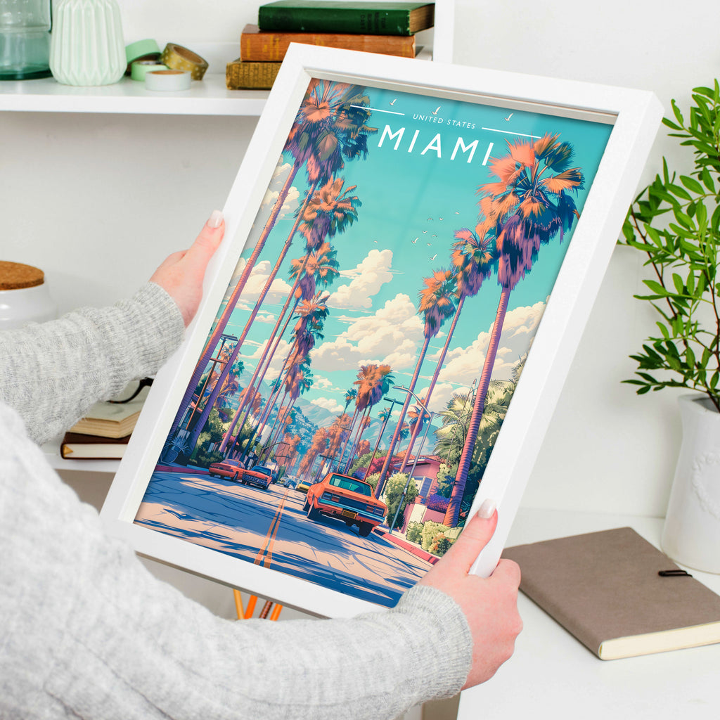 Miami Travel Poster in a white frame, held to show scale