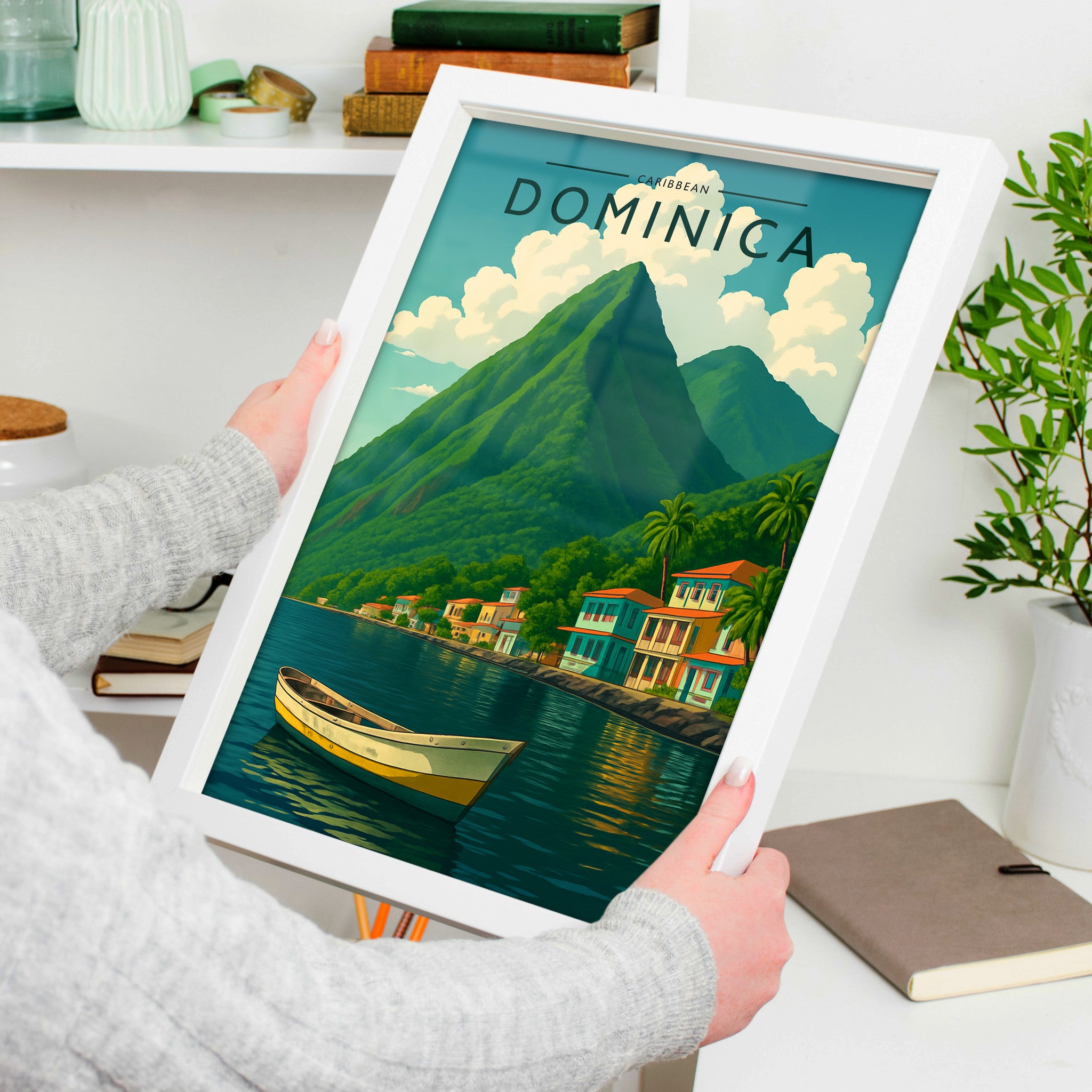 Dominica Travel Poster in a white frame, held to show scale