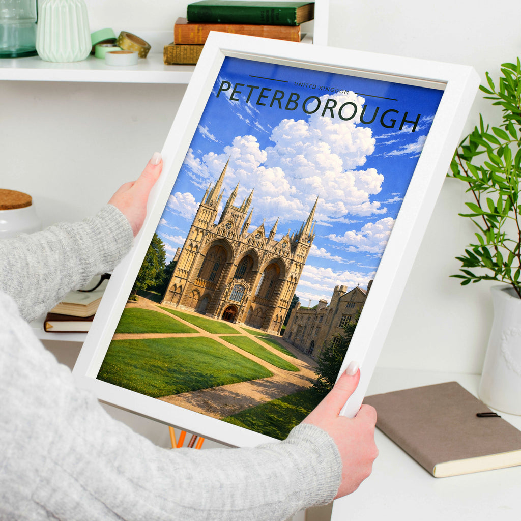 Peterborough #3 Travel Poster in a white frame, held to show scale