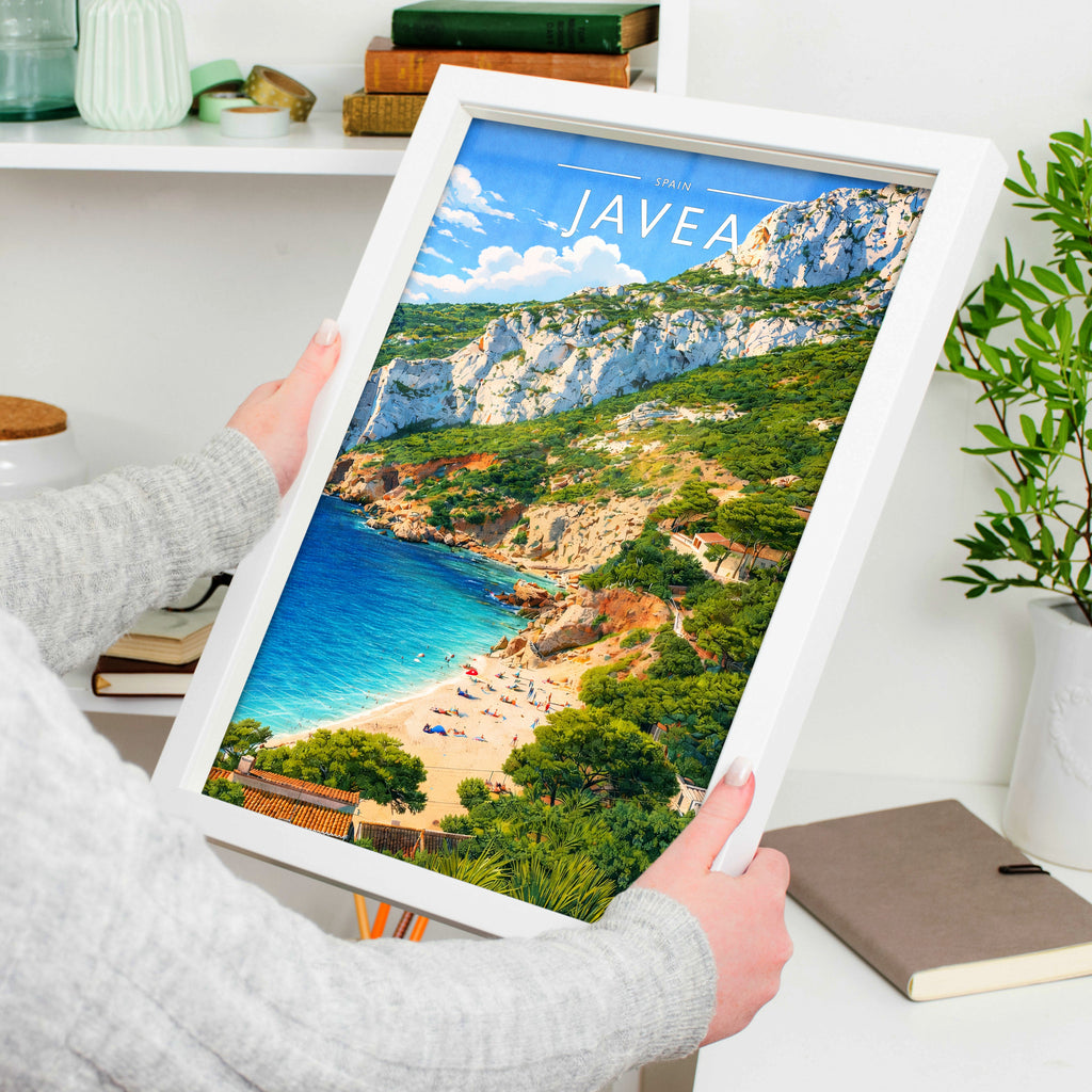 Javea Travel Poster in a white frame, held to show scale