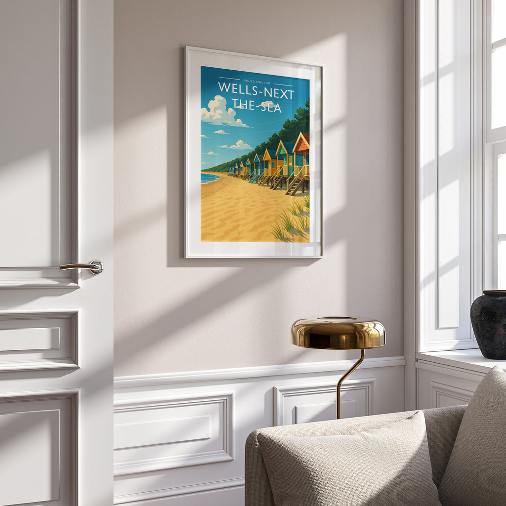 Wells-next-the-Sea Travel Poster in a white frame on a panelled wall
