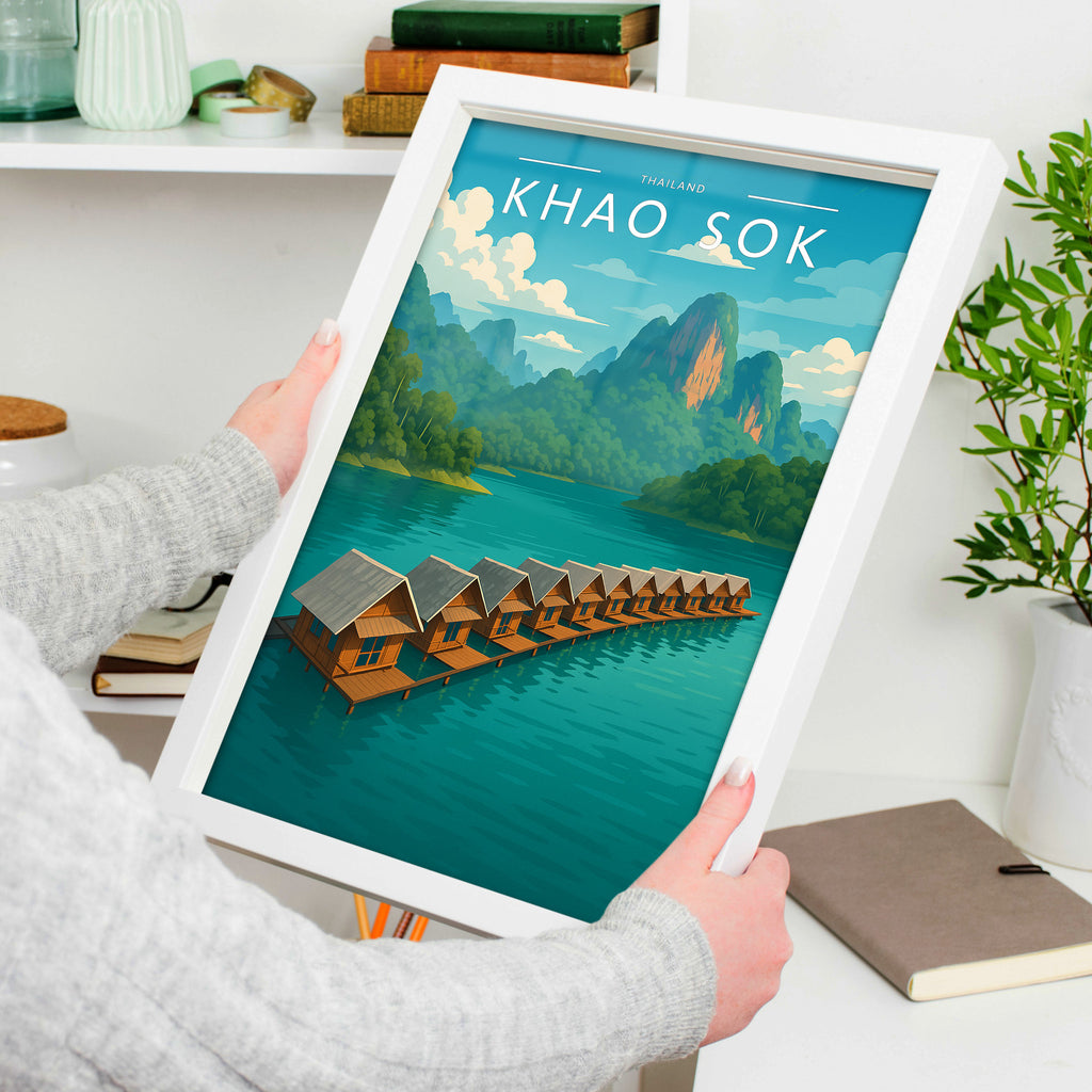 Khao Sok Travel Poster in a white frame, held to show scale