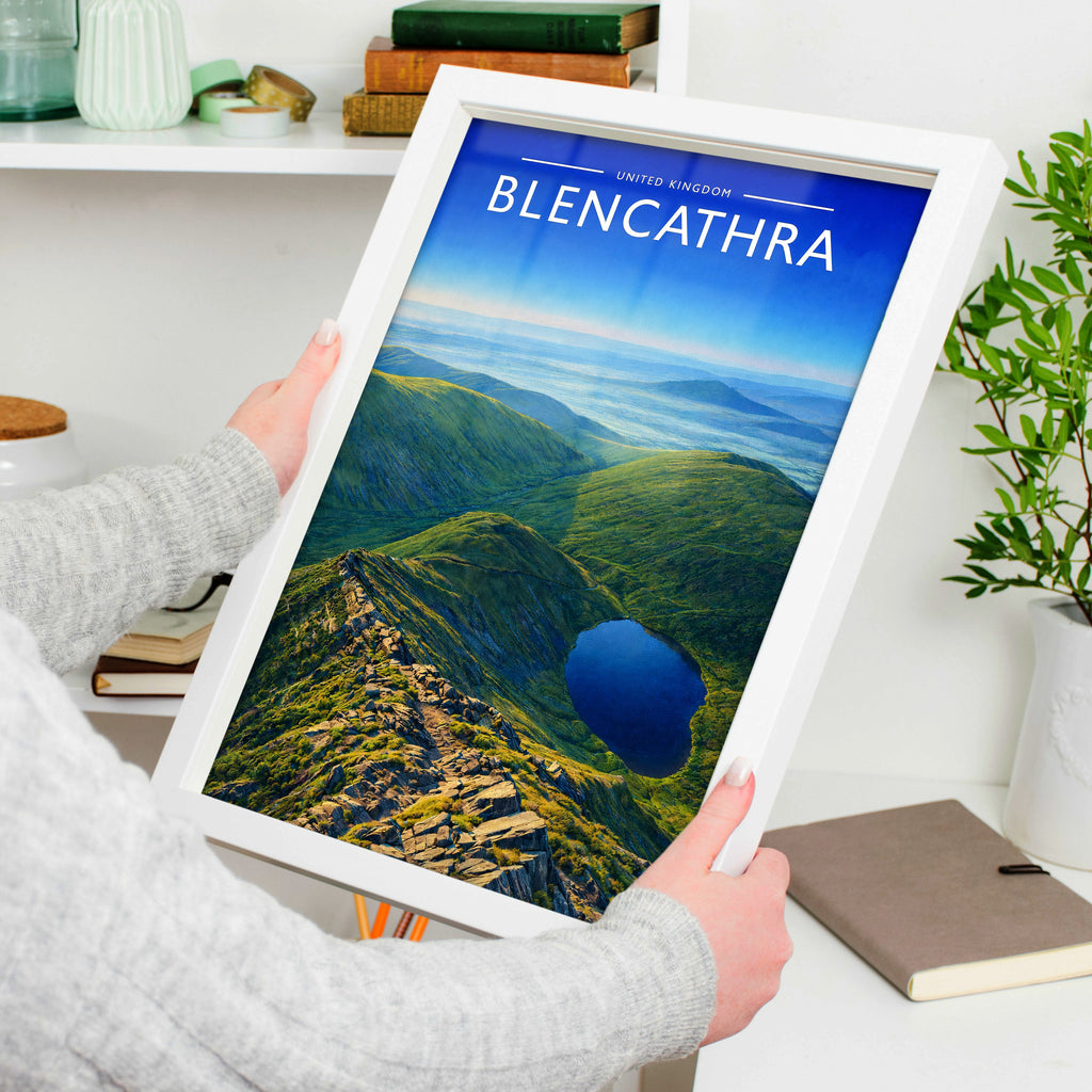 Blencathra Travel Poster in a white frame, held to show scale