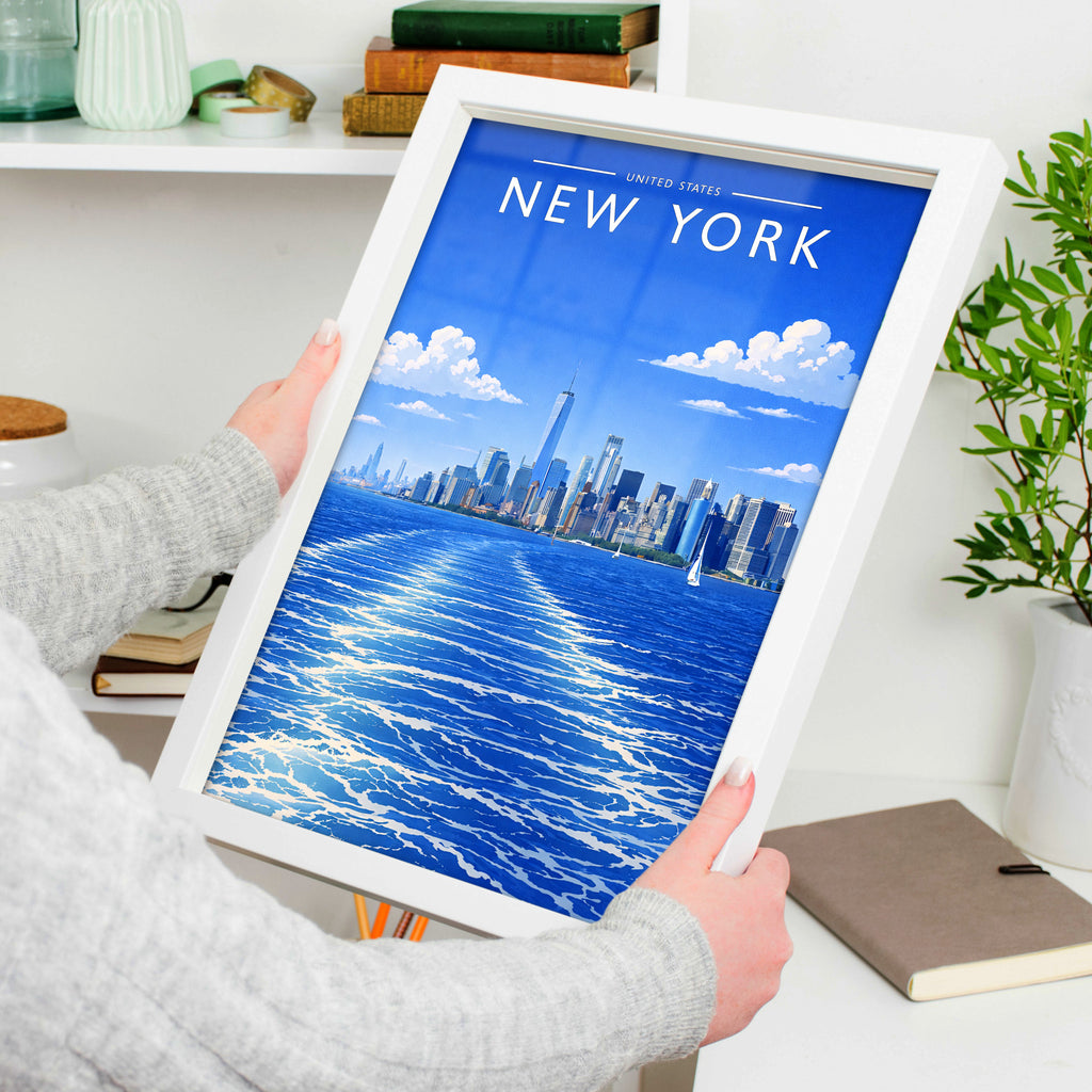 New York #3 Travel Poster in a white frame, held to show scale