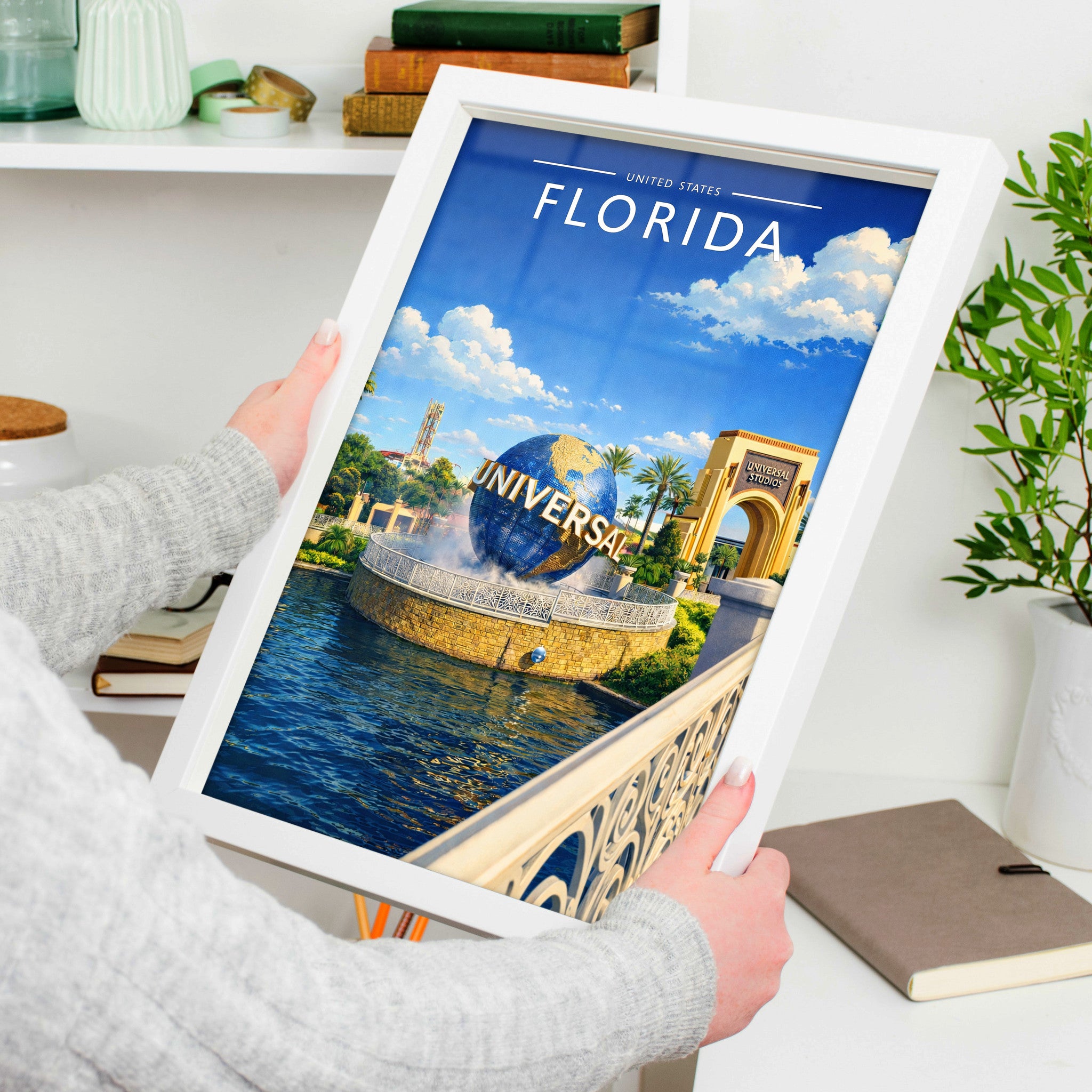 Florida Travel Poster in a white frame, held to show scale