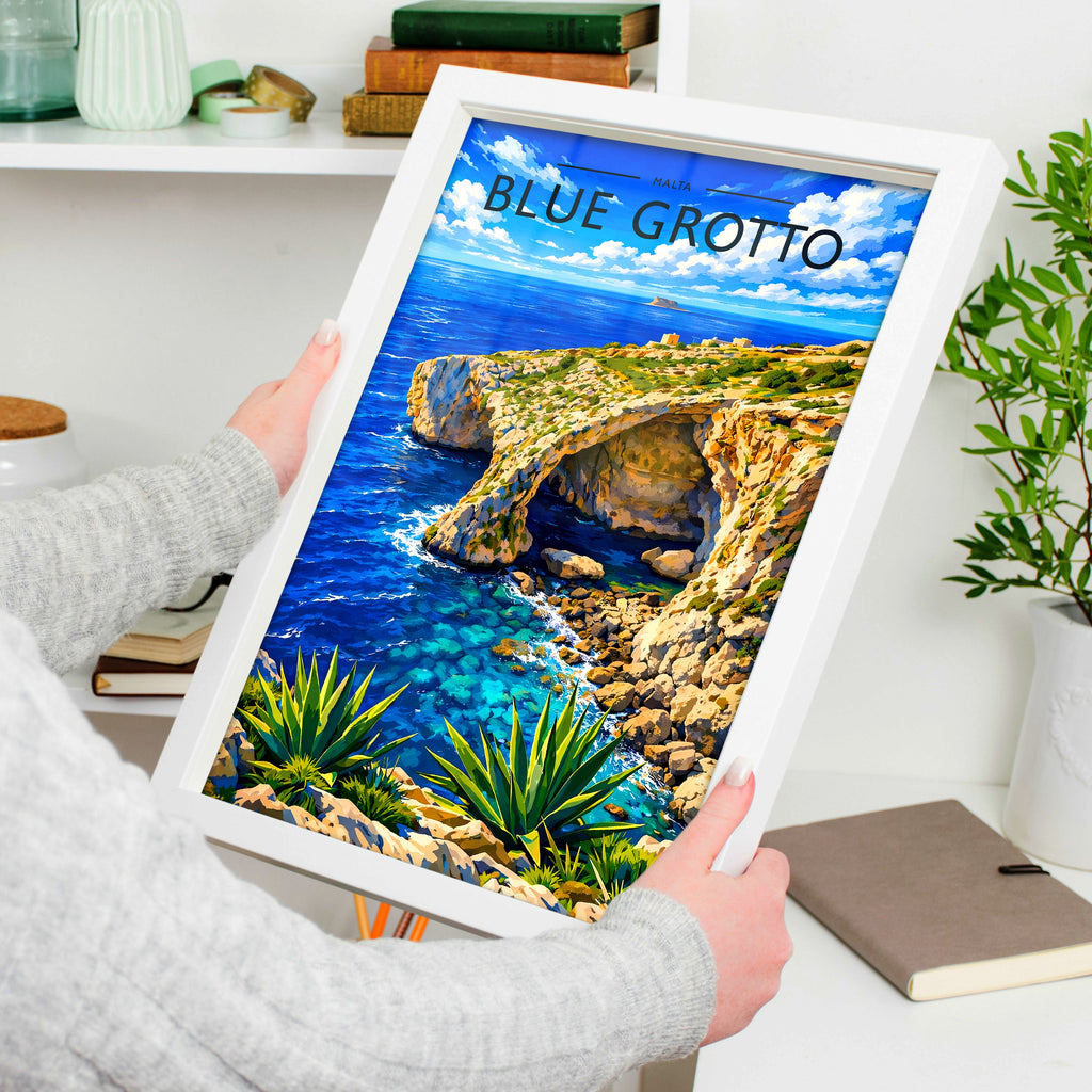 Blue Grotto Travel Poster in a white frame, held to show scale
