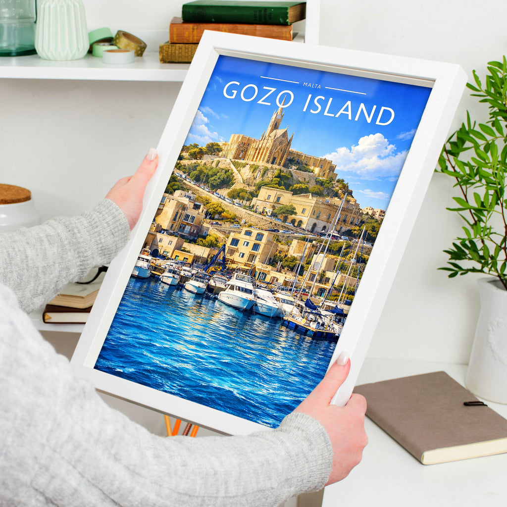 Gozo Island Travel Poster in a white frame, held to show scale