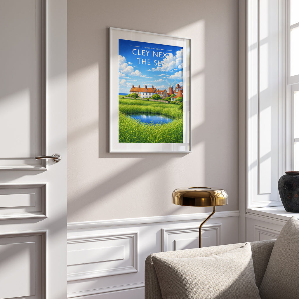 Cley next the Sea Travel Poster in a white frame on a panelled wall
