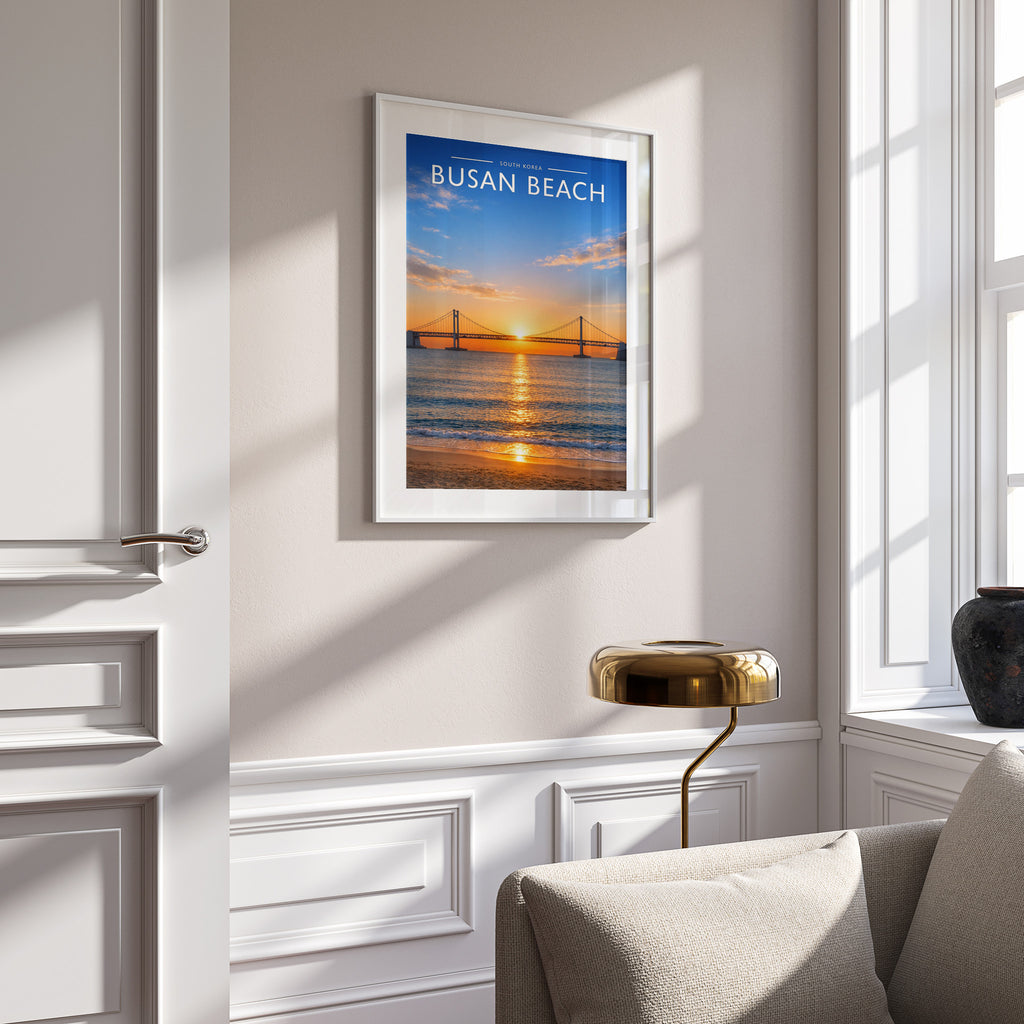 Busan Beach Travel Poster in a white frame on a panelled wall