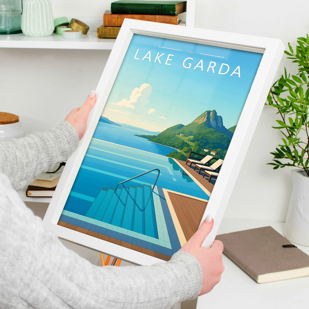 Lake Garda Travel Poster in a white frame, held to show scale