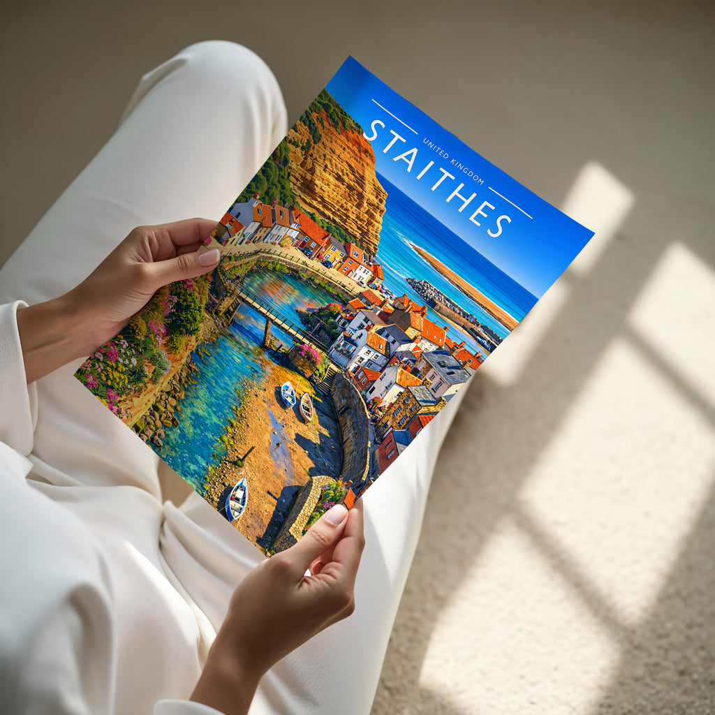Staithes Travel Poster - A4 print held in hand