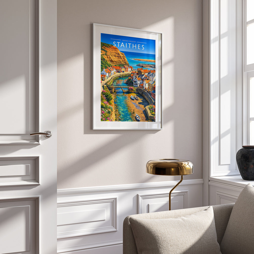 Staithes Travel Poster in a white frame on a panelled wall