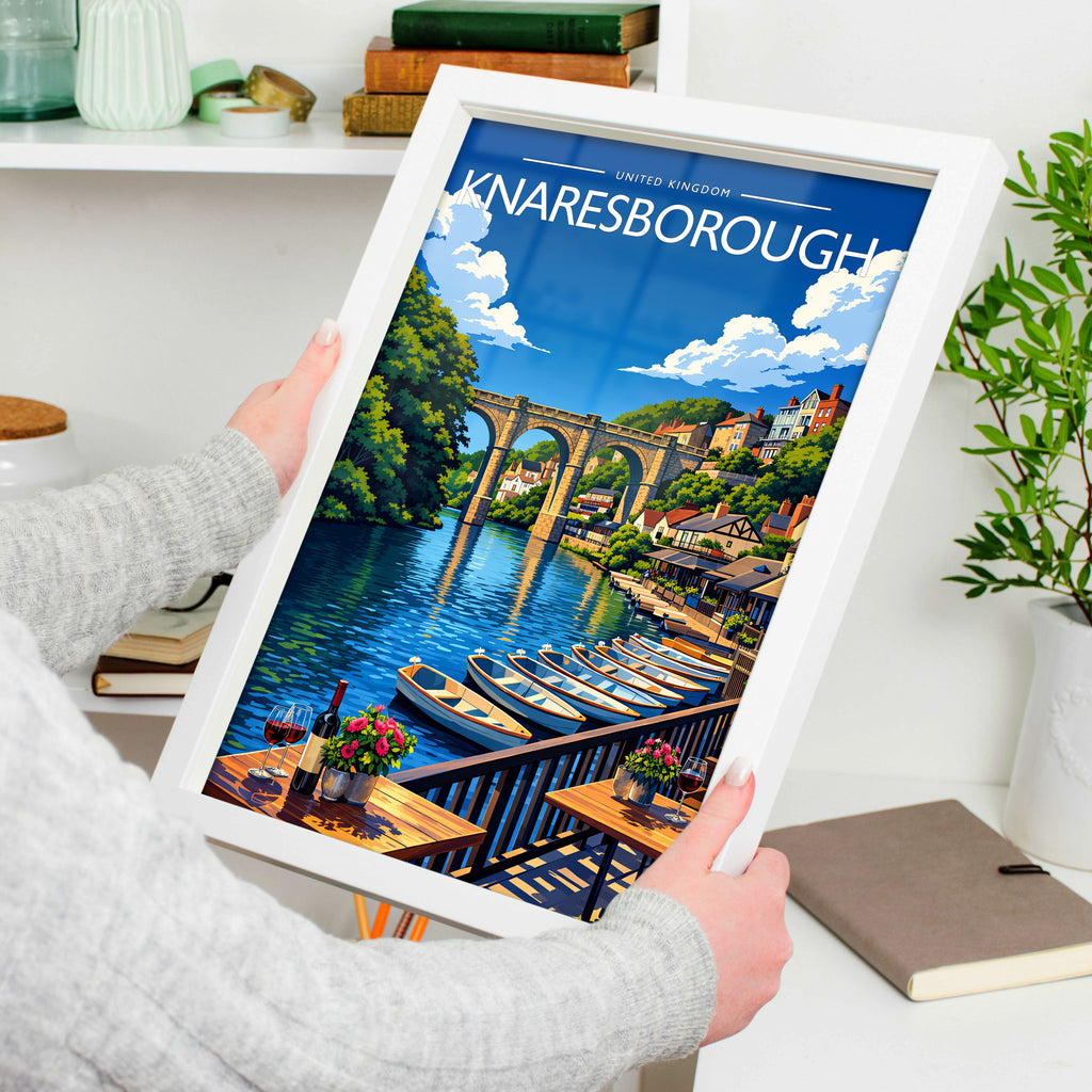 Knaresborough Travel Poster in a white frame, held to show scale