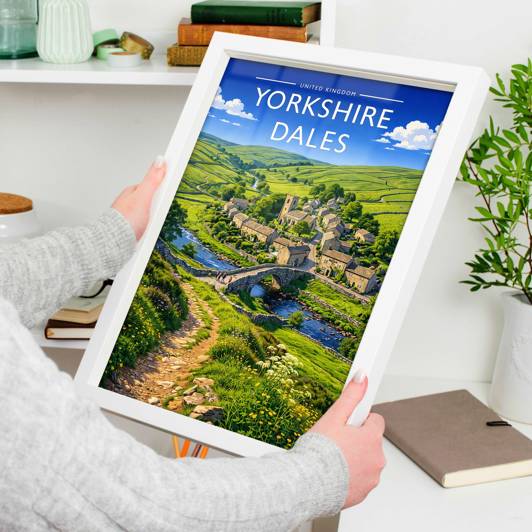 Yorkshire Dales #2 Travel Poster in a white frame, held to show scale