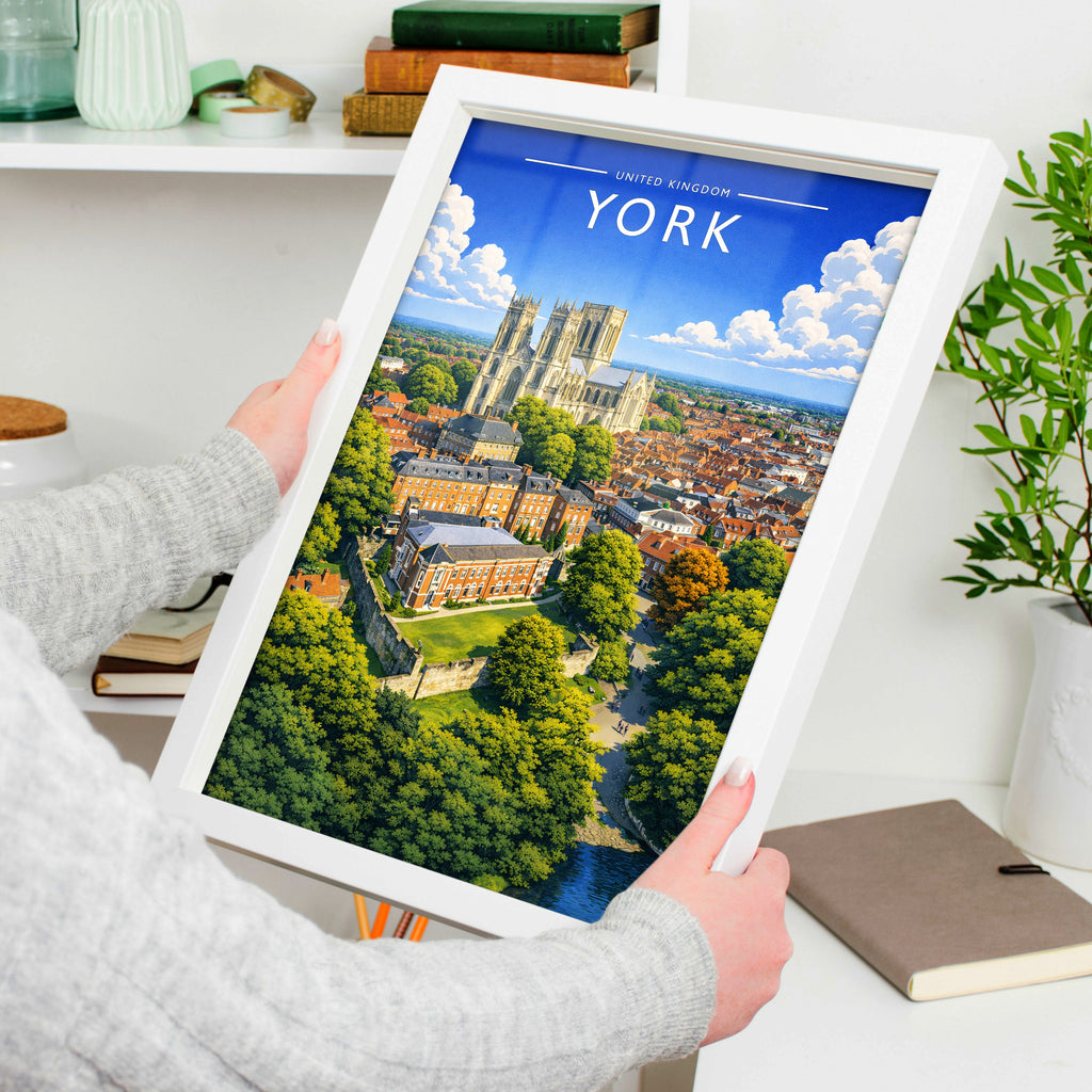 York #2 Travel Poster in a white frame, held to show scale