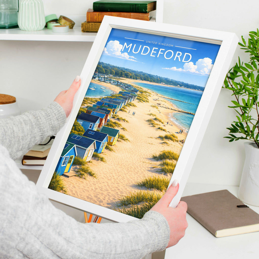 Mudeford Travel Poster in a white frame, held to show scale