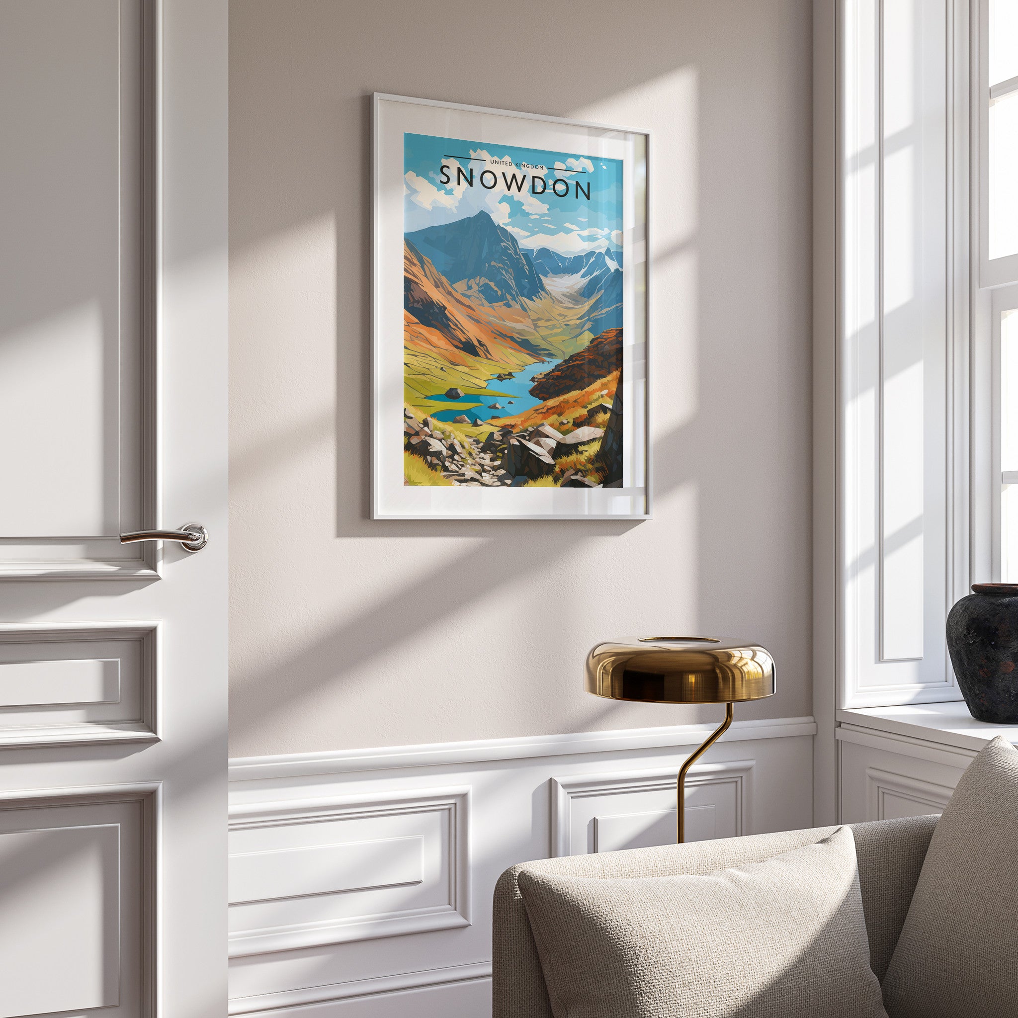 Snowdon Travel Poster in a white frame on a panelled wall