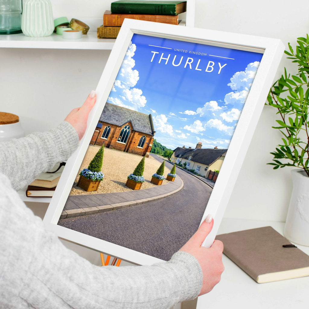 Thurlby Travel Poster in a white frame, held to show scale