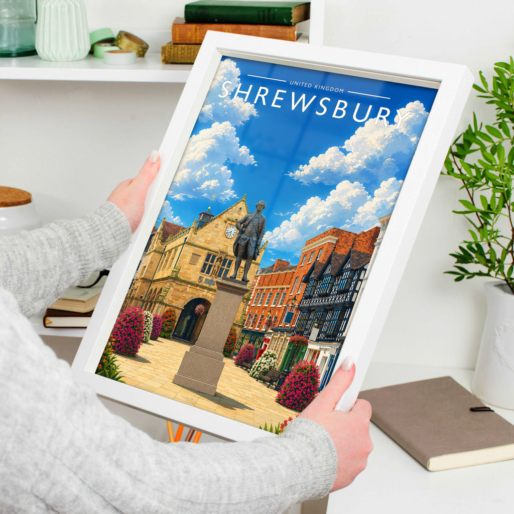 Shrewsbury Travel Poster in a white frame, held to show scale