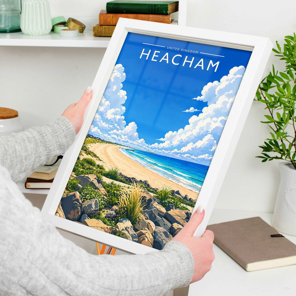 Heacham #3 Travel Poster in a white frame, held to show scale