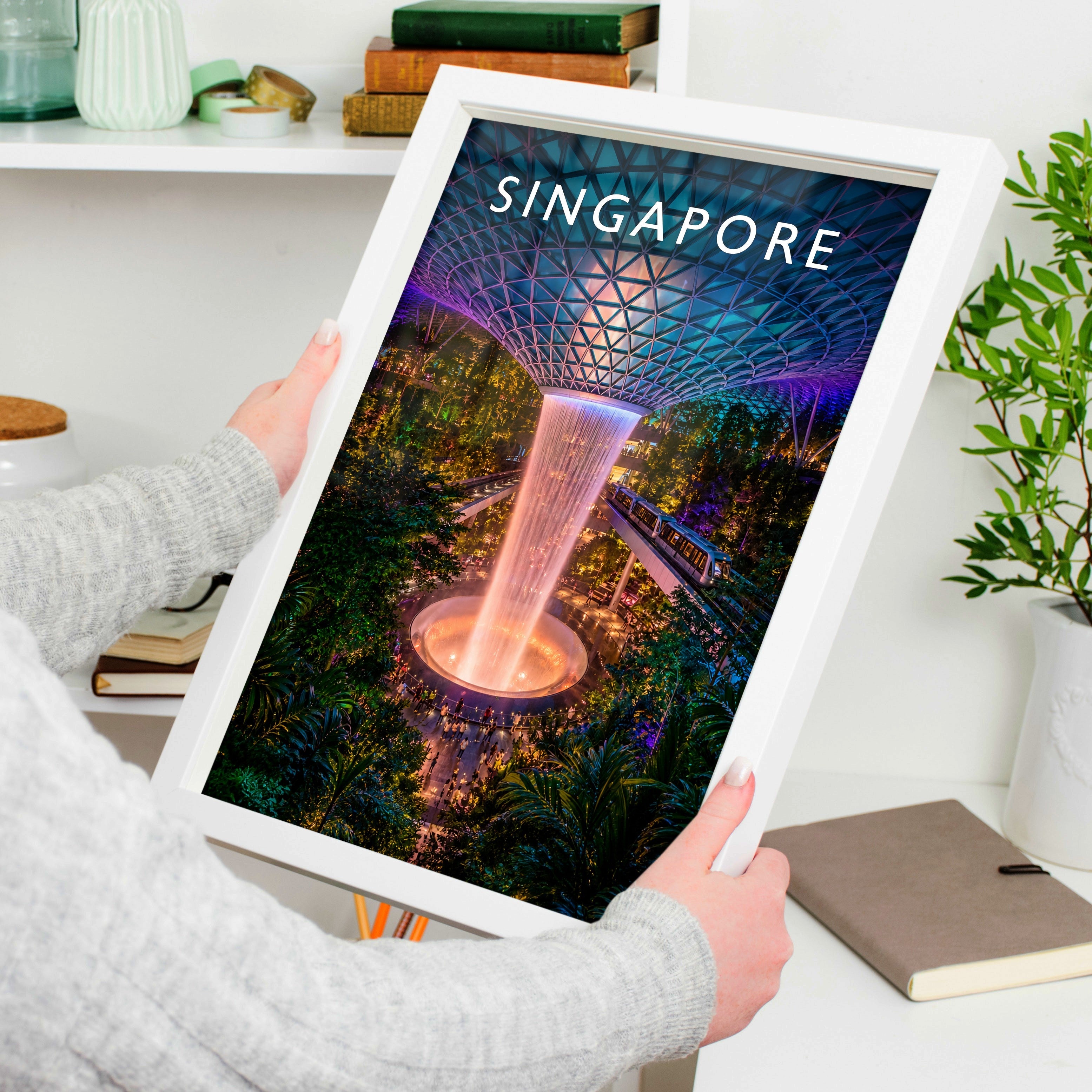 Singapore Travel Poster held in a white frame