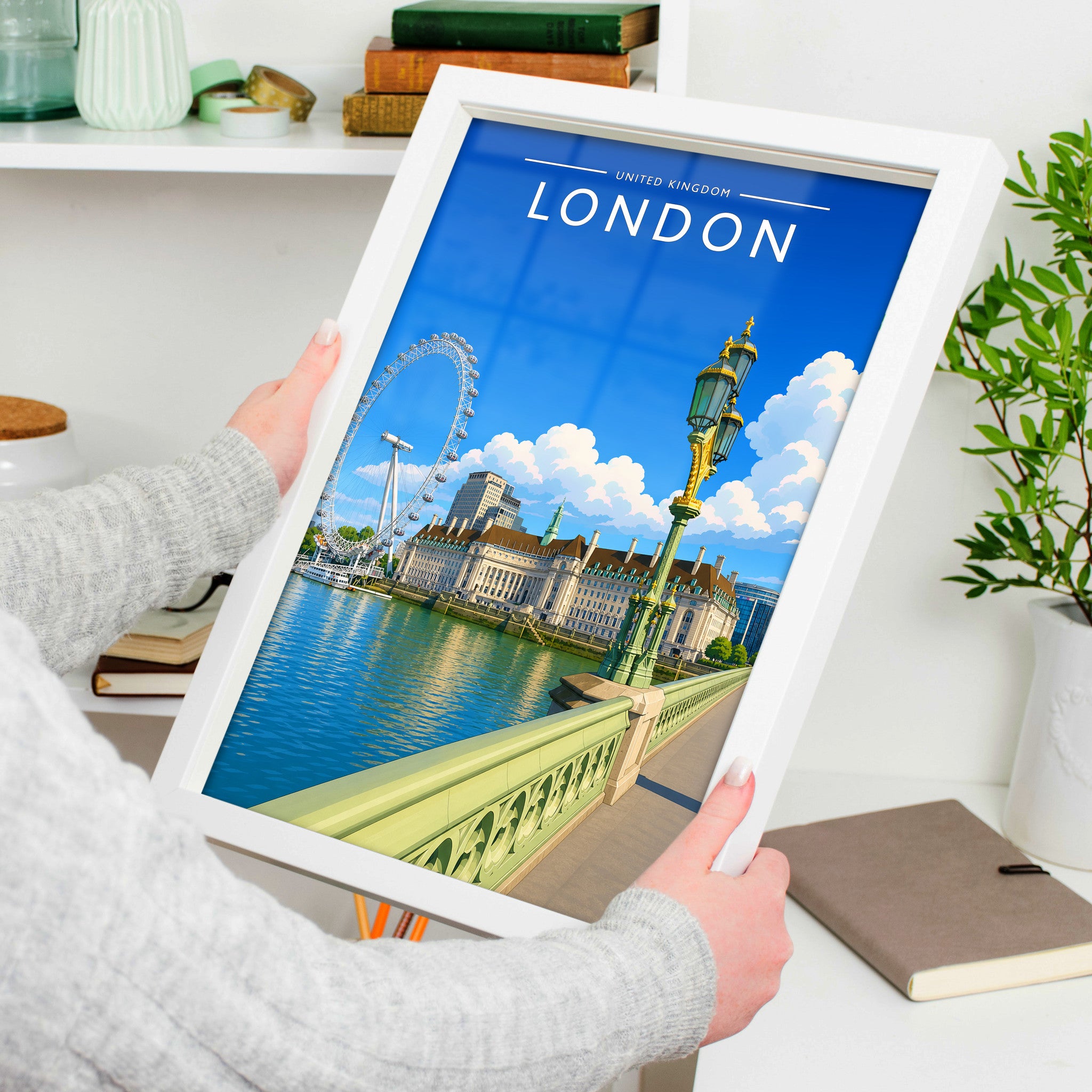 London #6 Travel Poster in a white frame, held to show scale