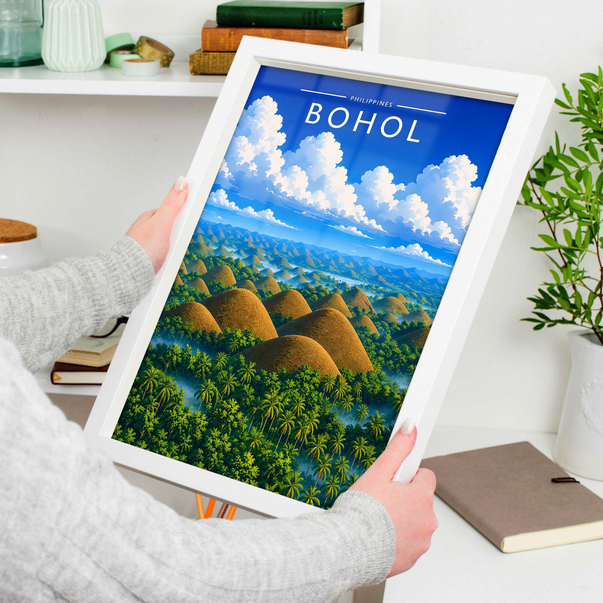Bohol #2 Travel Poster in a white frame, held to show scale