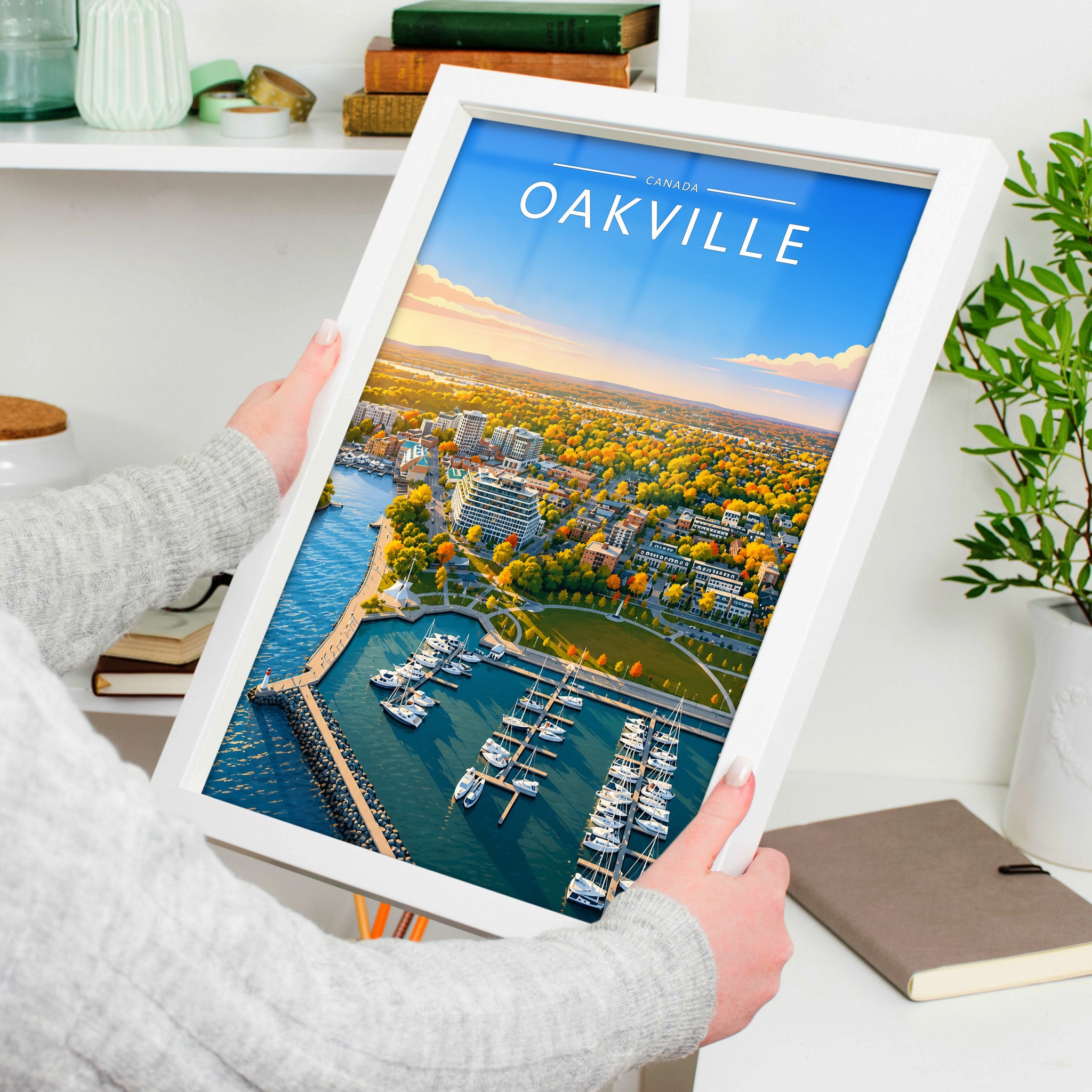 Oakville #2 Travel Poster in a white frame, held to show scale