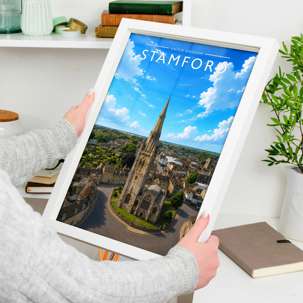 Stamford #11 Travel Poster in a white frame, held to show scale