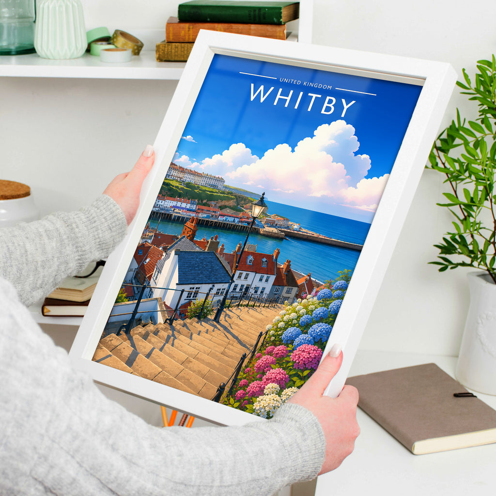 Whitby #3 Travel Poster in a white frame, held to show scale