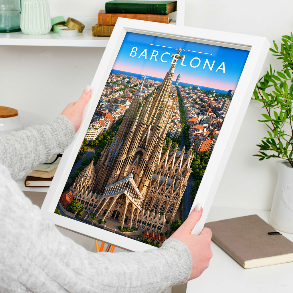 Barcelona Travel Poster in a white frame, held to show scale