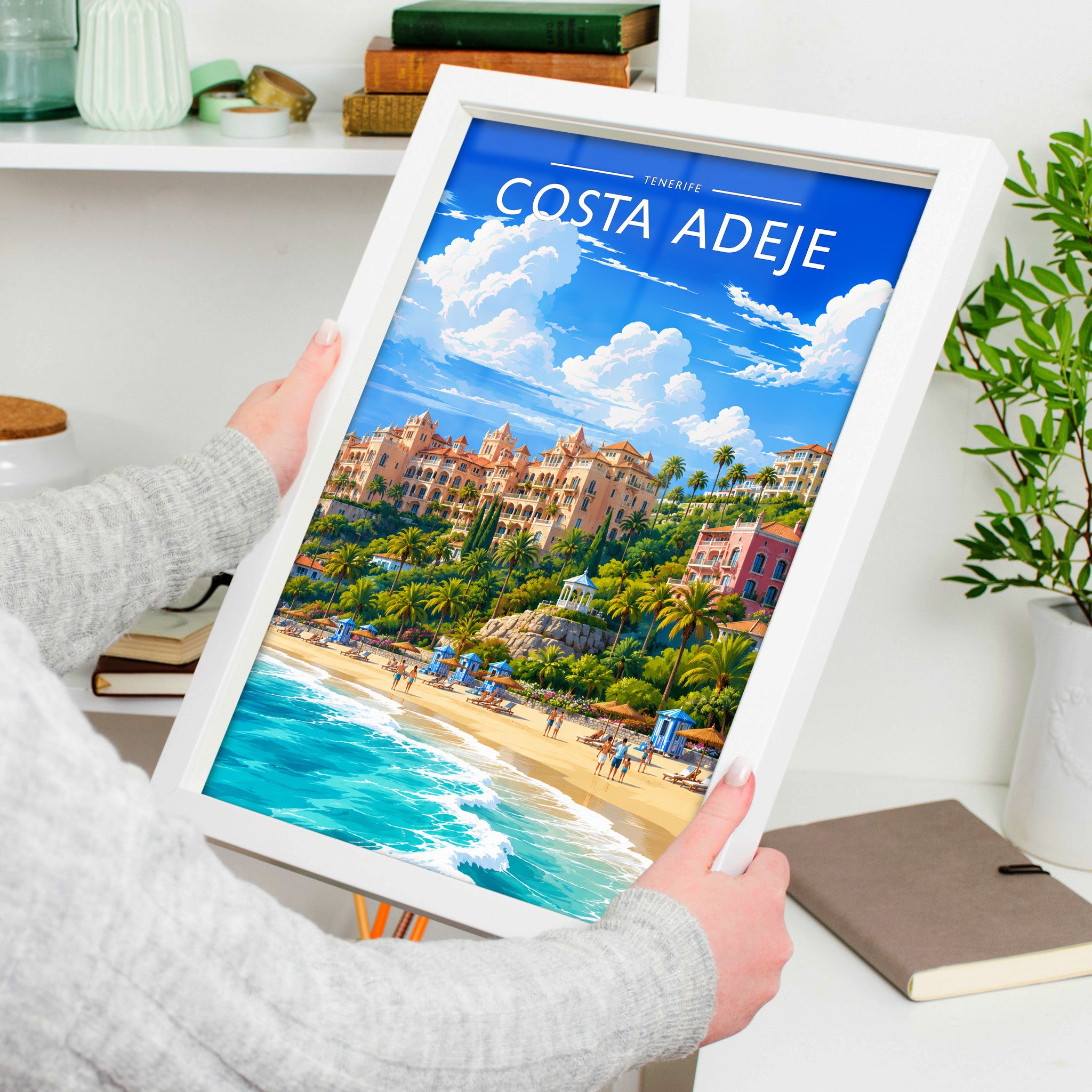 Costa Adeje #3 Travel Poster in a white frame, held to show scale