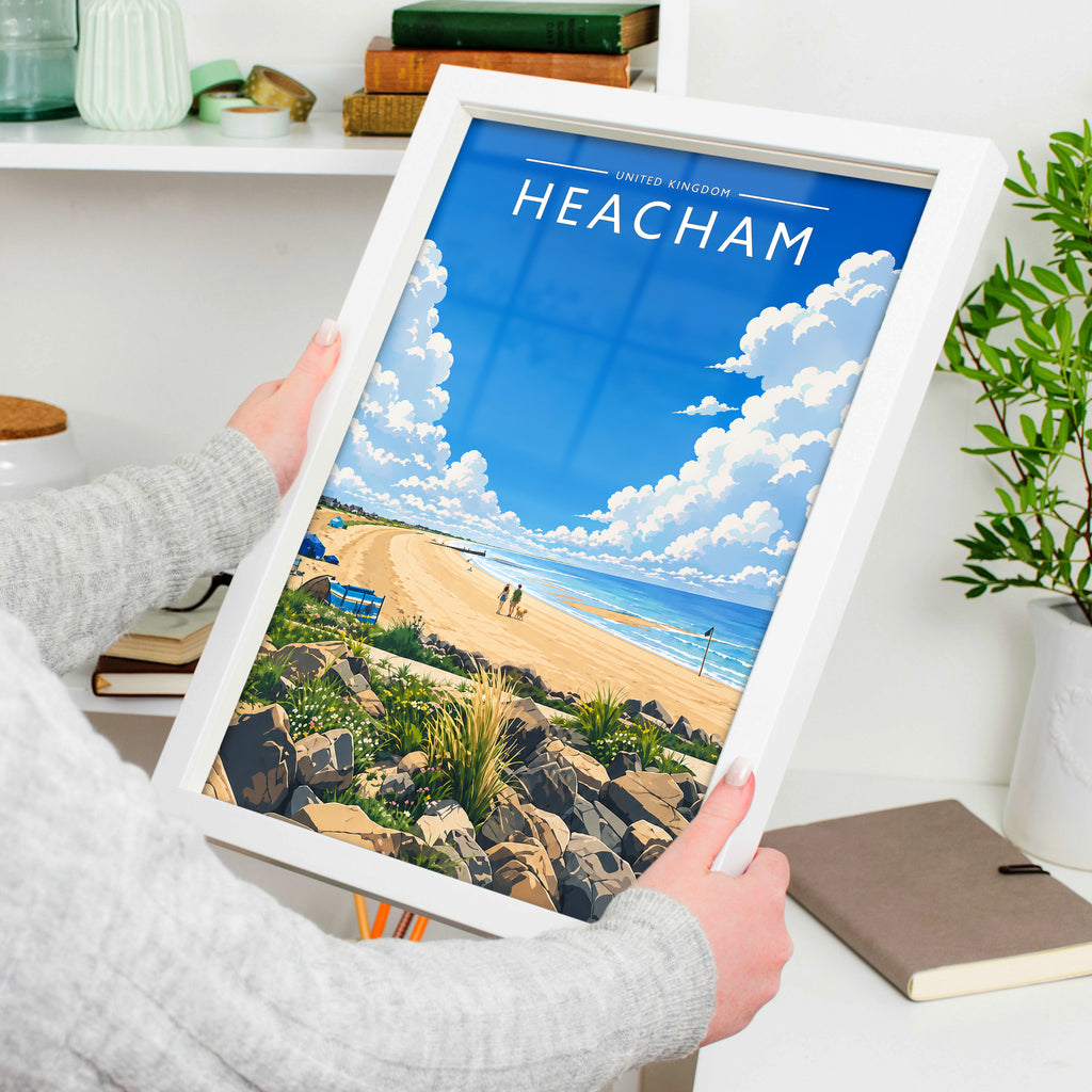 Heacham #4 Travel Poster in a white frame, held to show scale