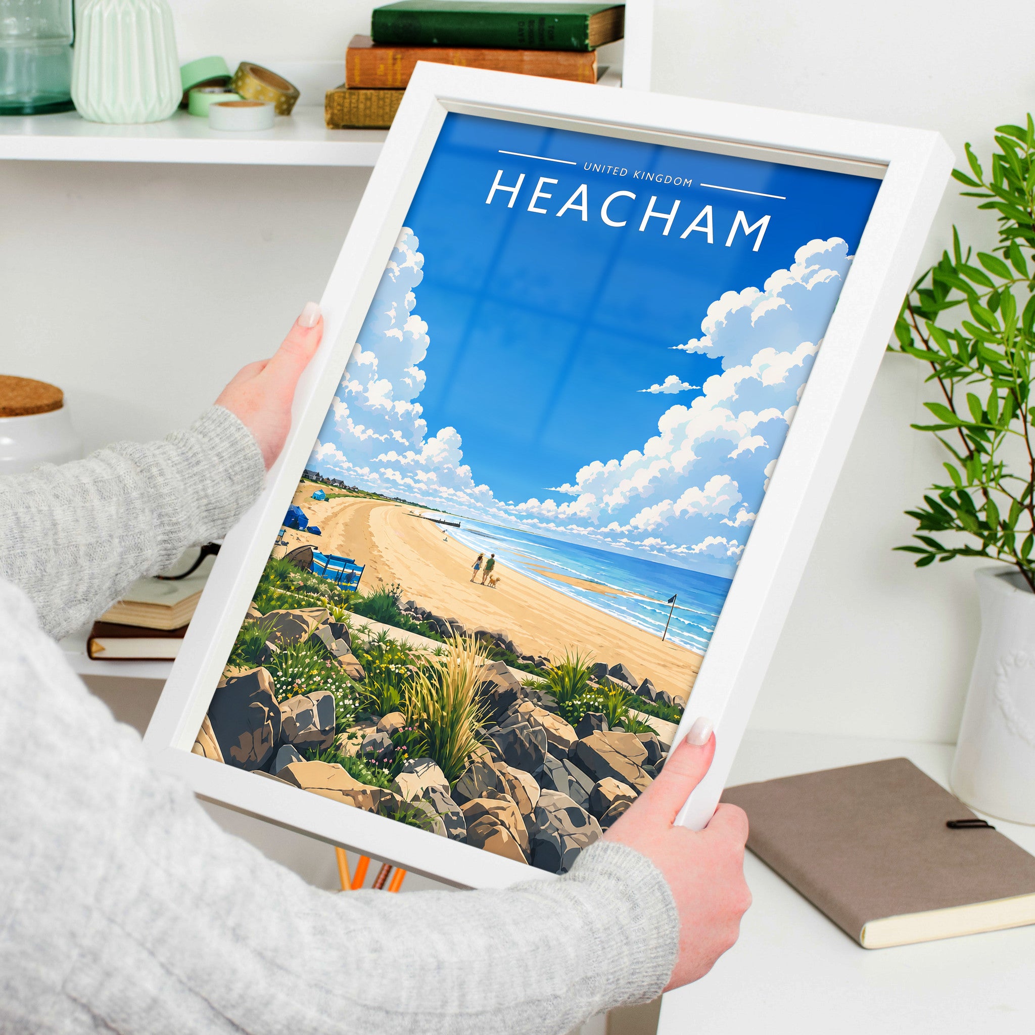 Heacham #4 Travel Poster in a white frame, held to show scale