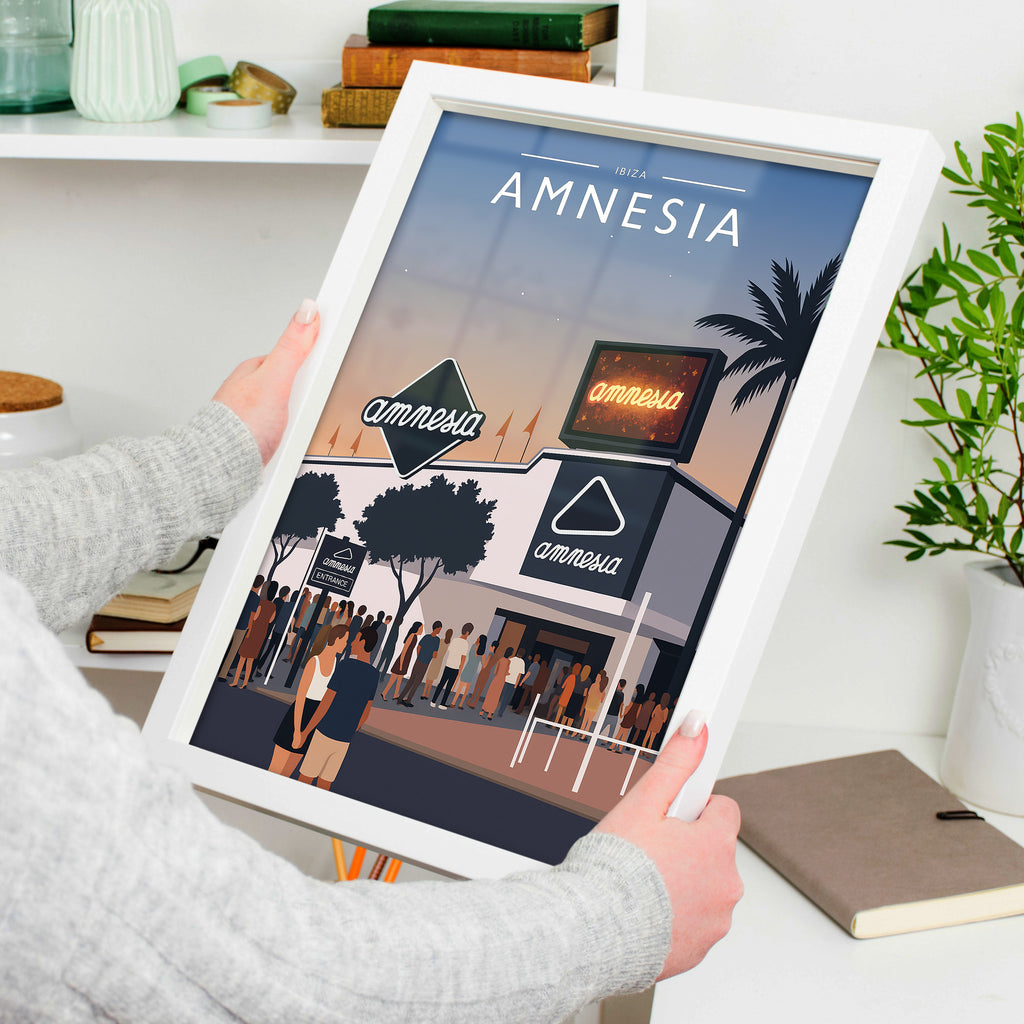 Ibiza #3 Travel Poster in a white frame, held to show scale