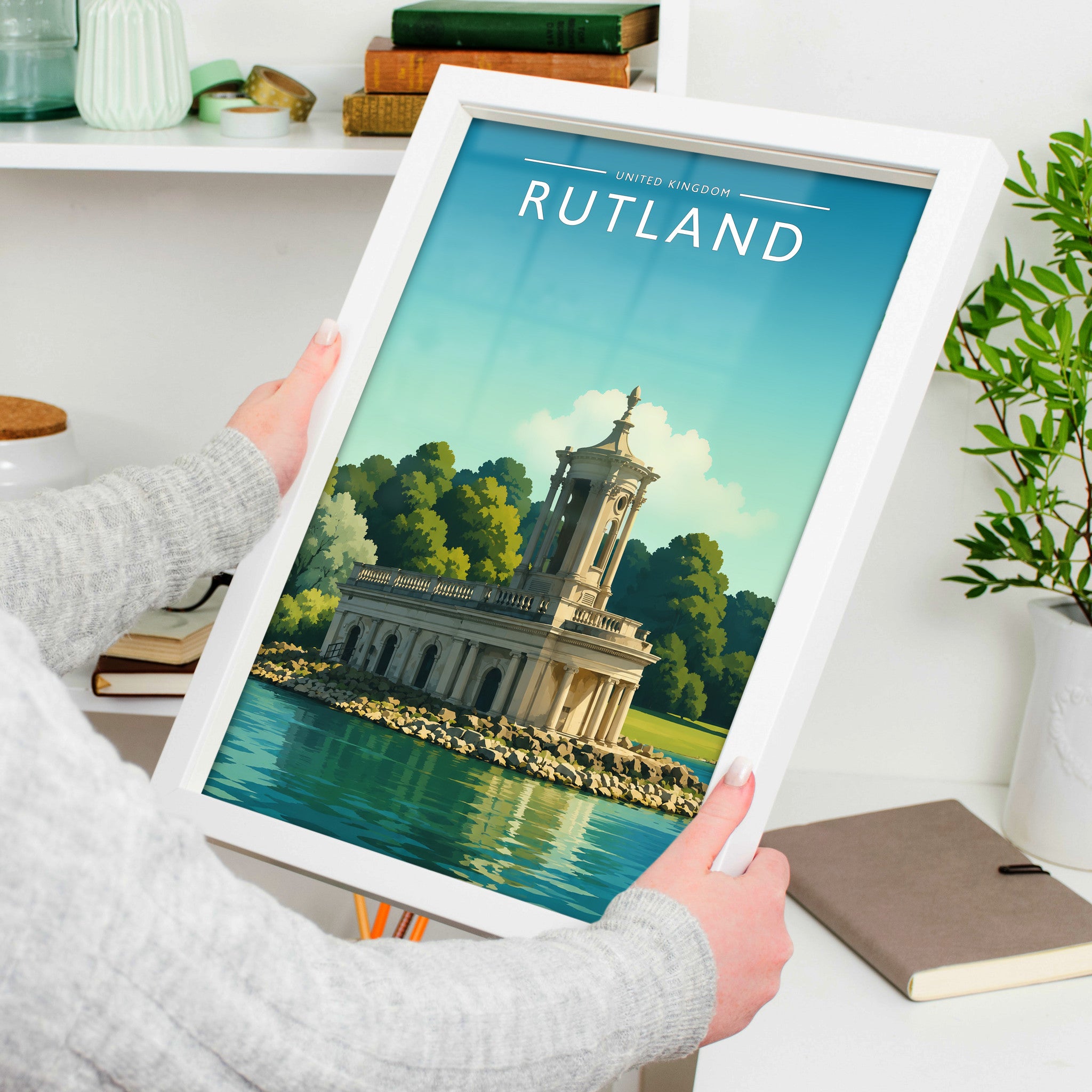 Rutland #2 Travel Poster in a white frame, held to show scale