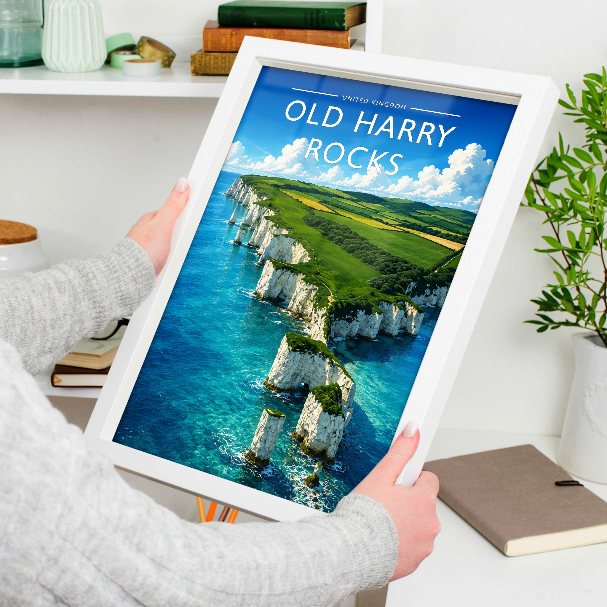 Old Harry Rocks Travel Poster in a white frame, held to show scale