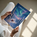 Lapland Travel Poster - A4 print held in hand