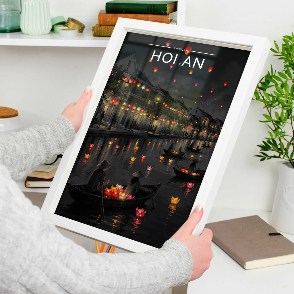 Hoi An Travel Poster in a white frame, held to show scale