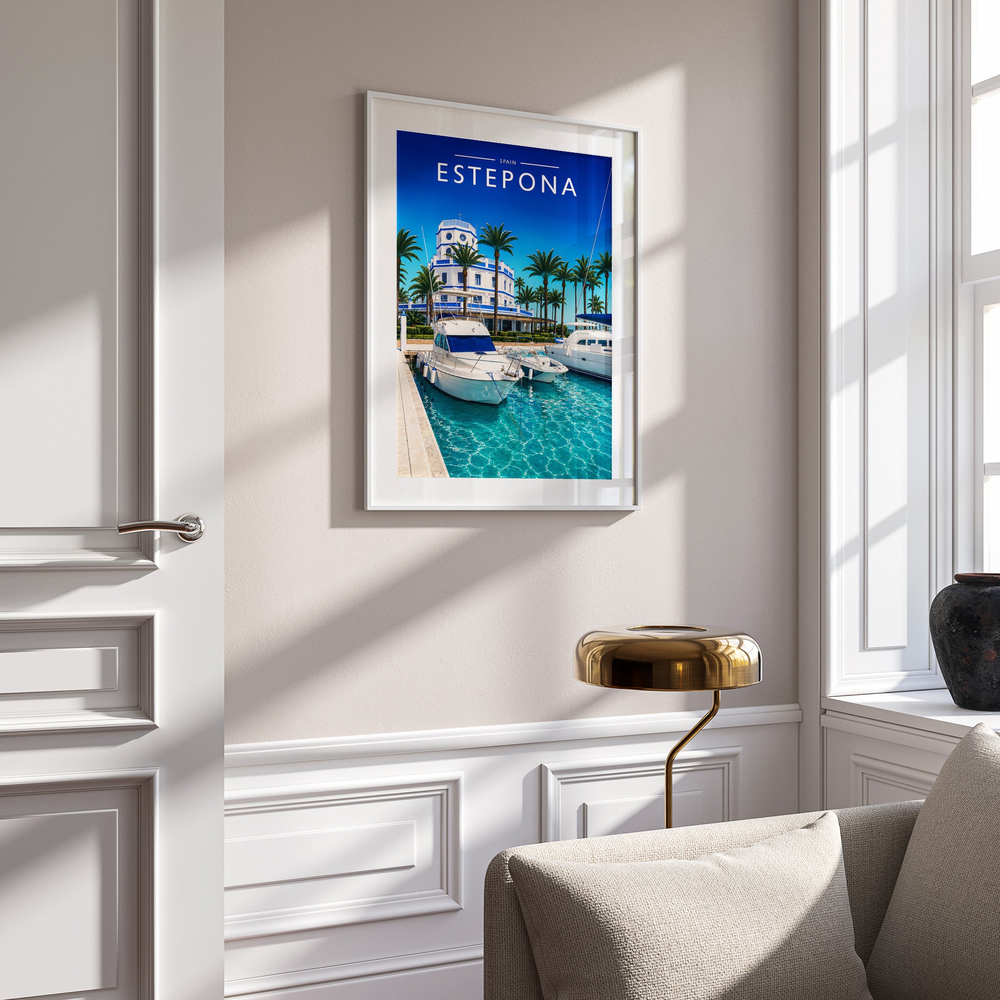 Estepona Travel Poster in a white frame on a panelled wall