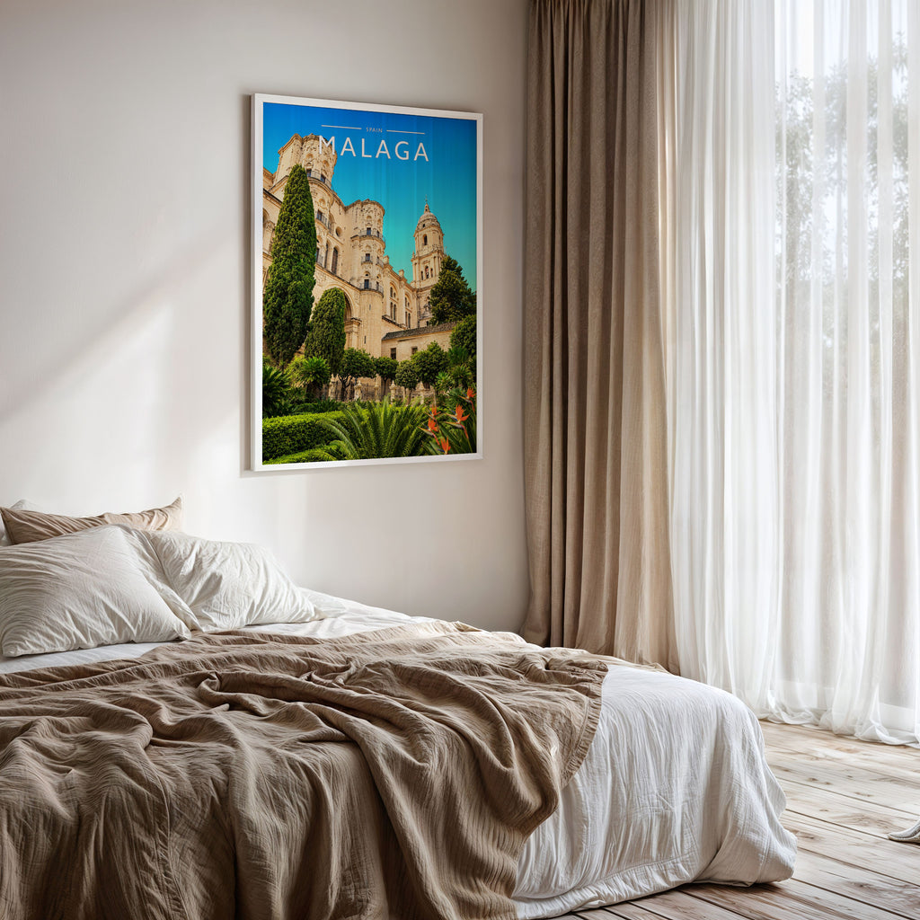 Malaga Travel Poster framed on a bedroom wall